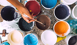 Various open cans of paint