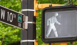 Crosswalk walk signal at West 10th Ave