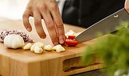 Cutting vegetables on a cutting board